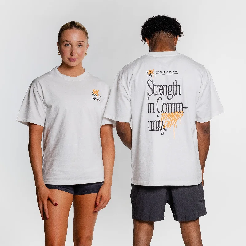 Men's Three-Quarter Sleeved TopsTWL - LIFESTYLE OVERSIZED T-SHIRT - STRENGTH IN COMMUNITY - FADED WHITE/ORANGE