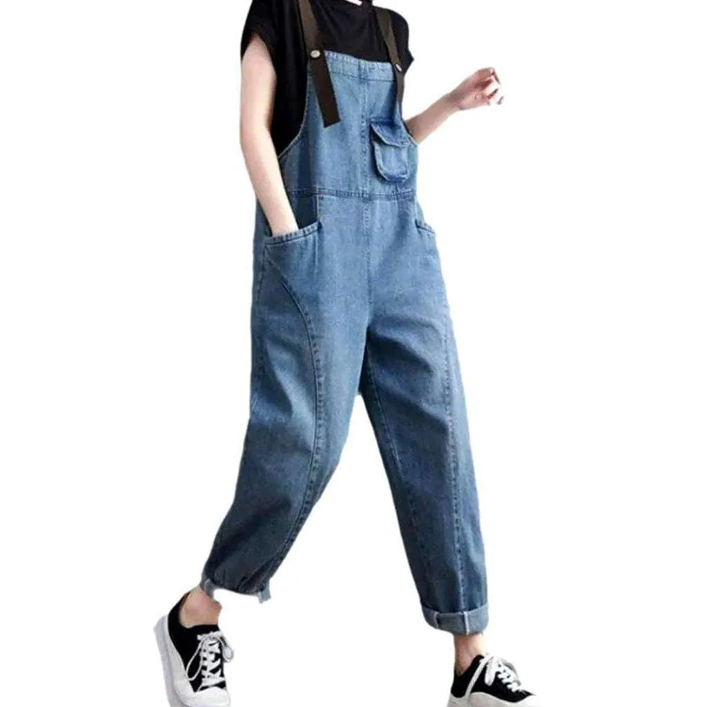 Stonewashed women's jeans dungaree